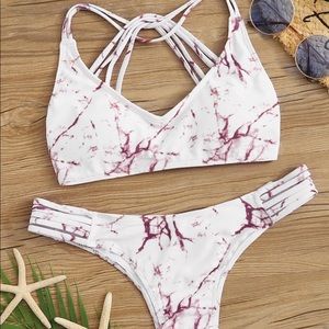 Two-piece, pink marbled swimsuit